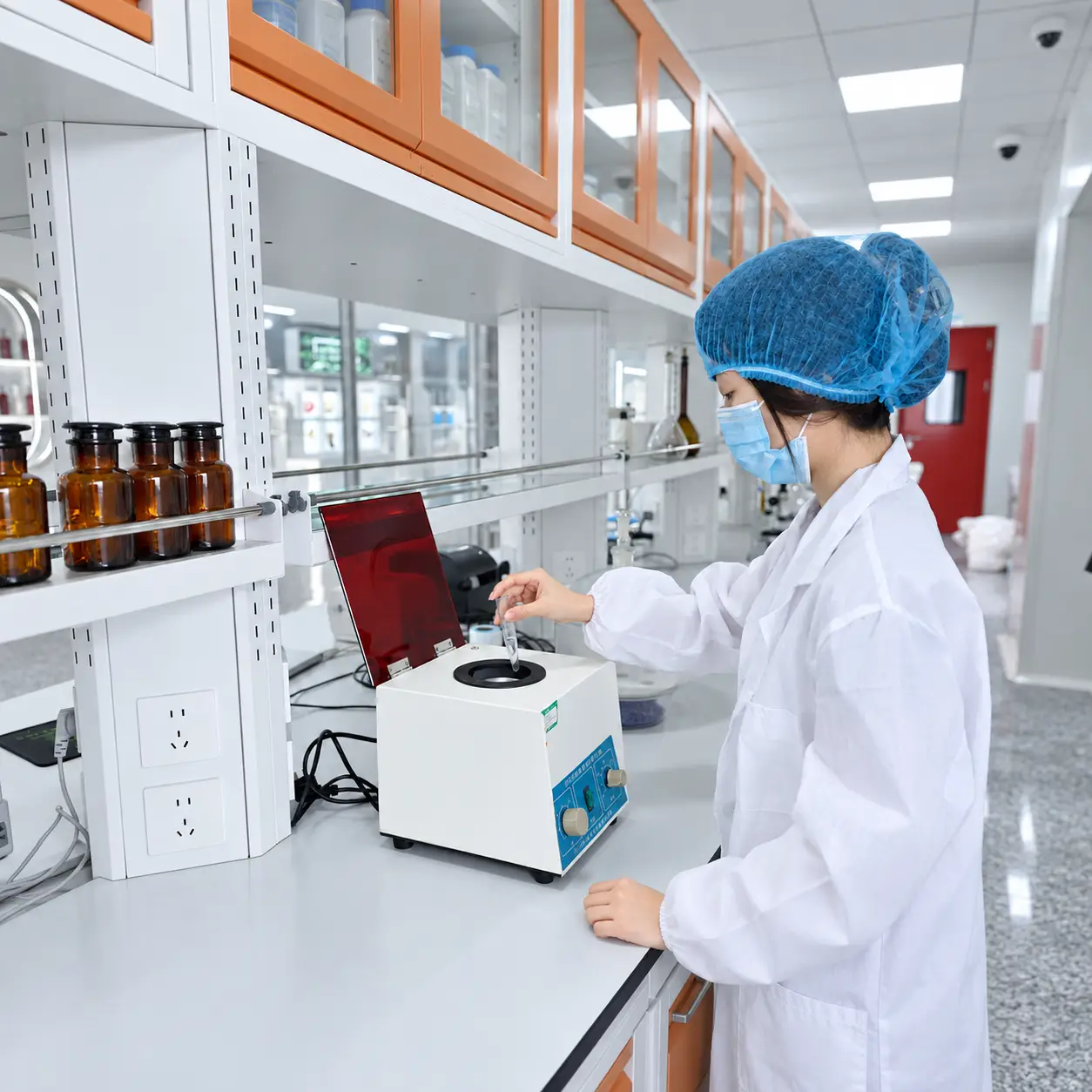 Laboratory technician testing a hair care sample