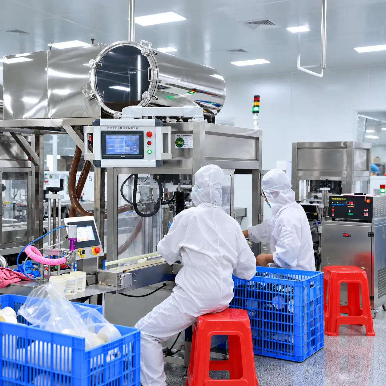 Operators working at a hair care product filling line